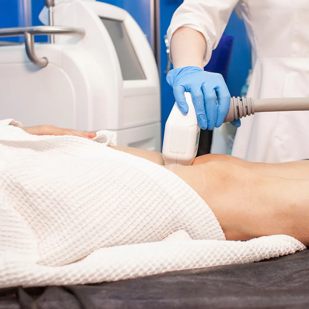 A patient undergoing a CoolSculpting treatment.